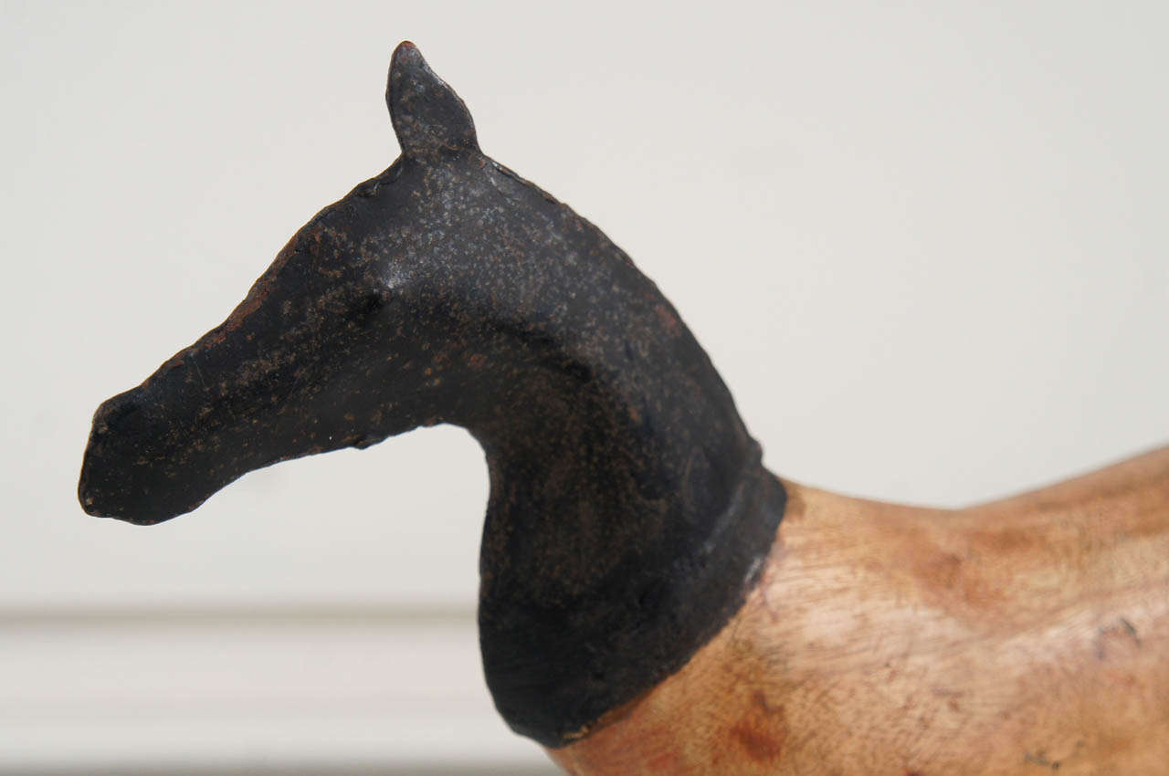 Primitive A Wood and Metal Horse Sculpture