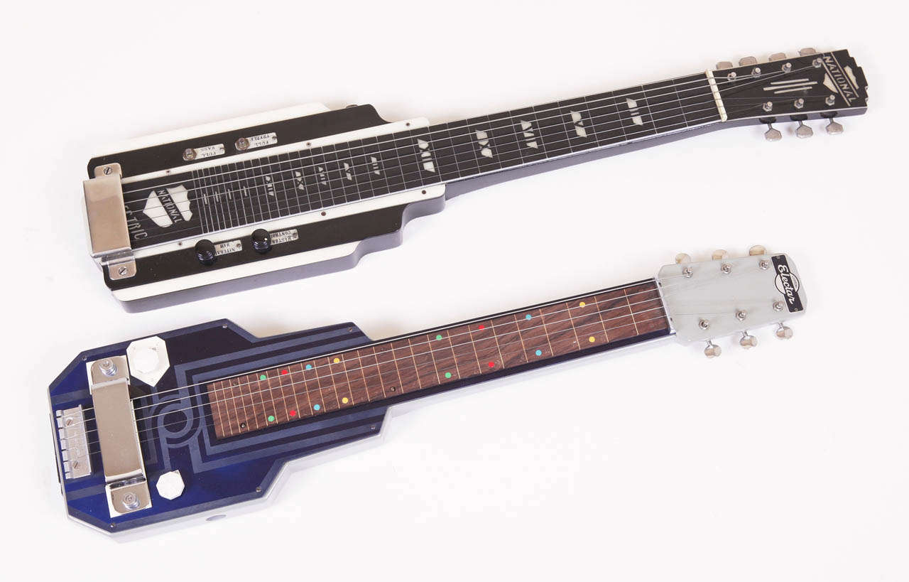 Art Deco Machine Age Electar Epiphone Lap Steel Guitar, Patented Design 1937

Original Epi Strathopoulos design, in etched cobalt catalin (bakelite) laminate.

Model M, Hawaiian, Stamped 2488 into the headstock, which appears to date it 1939.
The