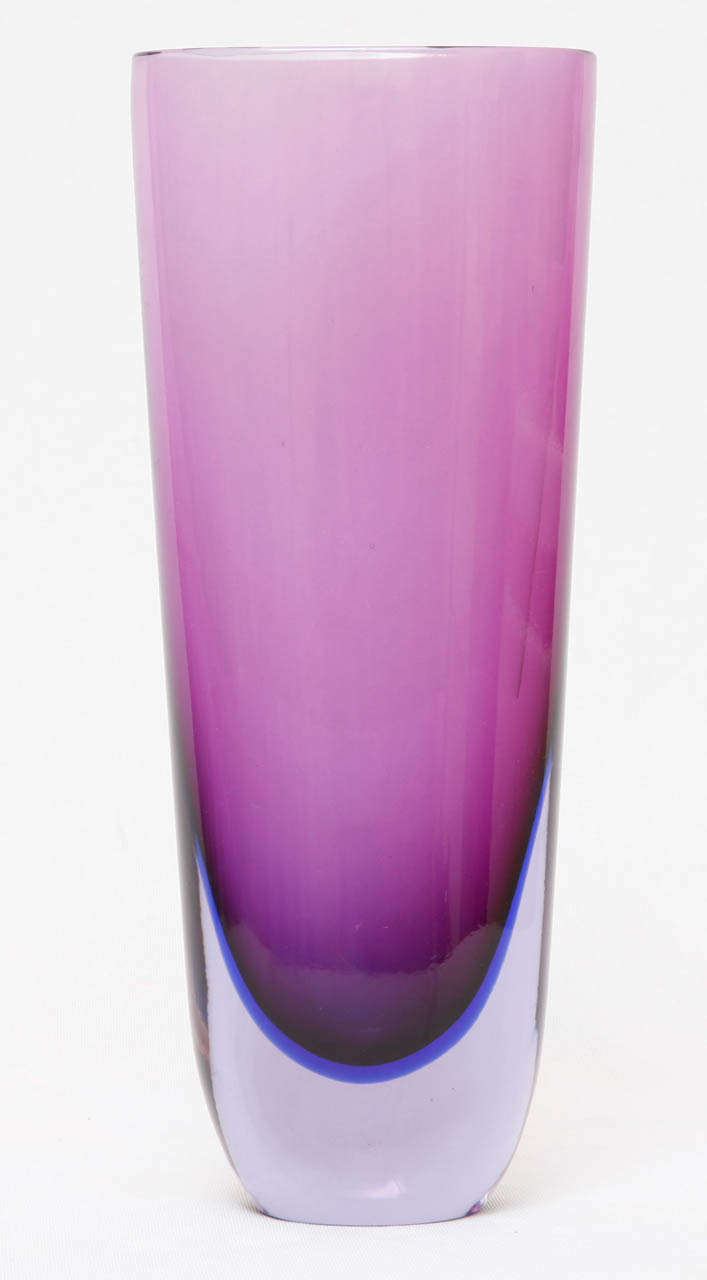 A tall and oval-shaped glass vase designed by Flavio Poli (1900-1984) and executed by Seguso Vetri D'Arte, a glasswoorks in Murano, Italy.