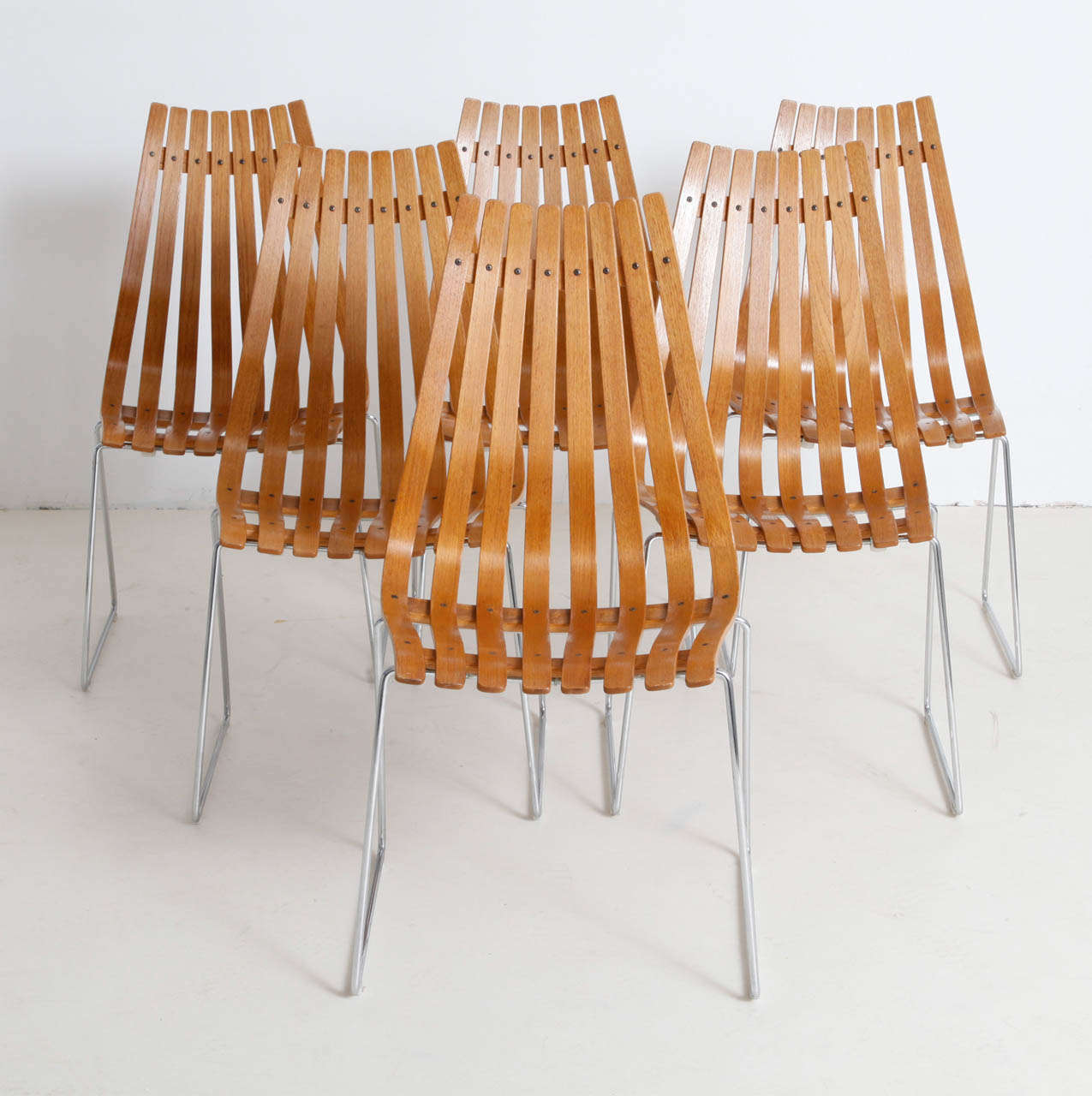 6 chairs designed by Hans Brattrud made by Hove, Norway, 1970s.
Very nice blond Teck, perfect condition.