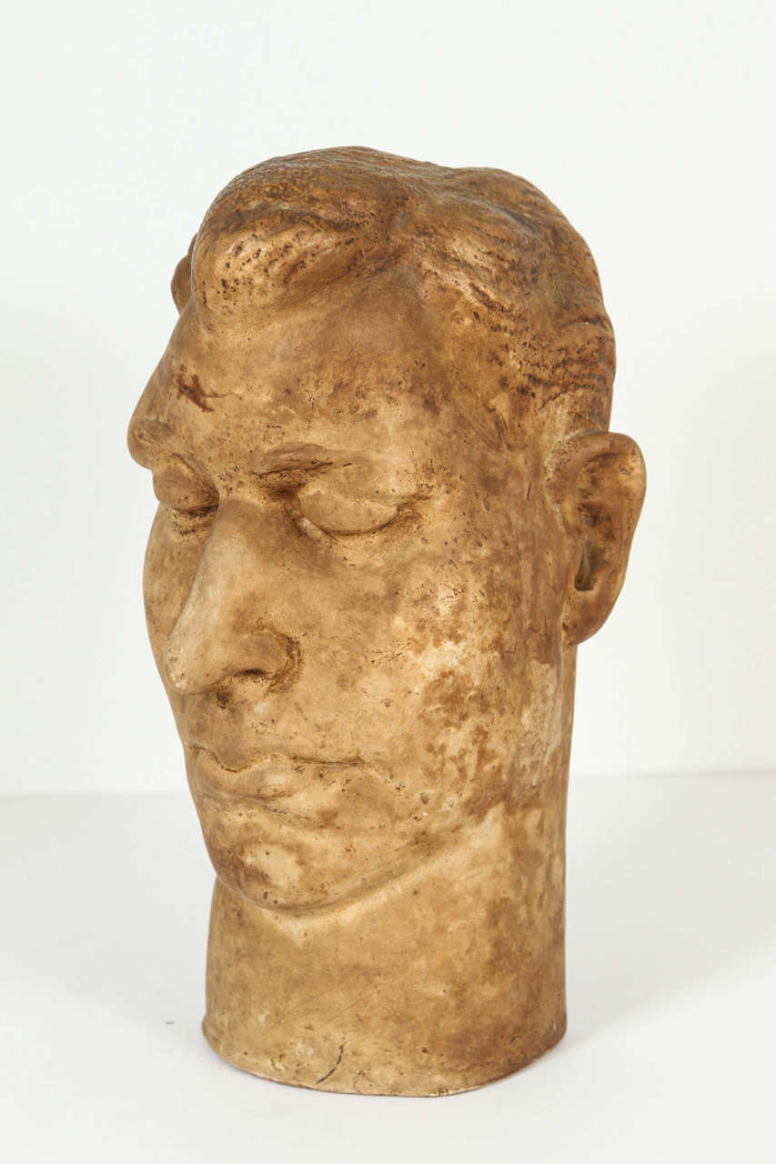 1940s bust of a man.