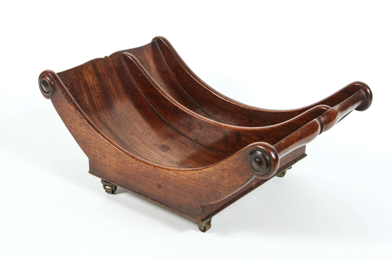 An English mahogany cheese trolley with casters, circa 1800
