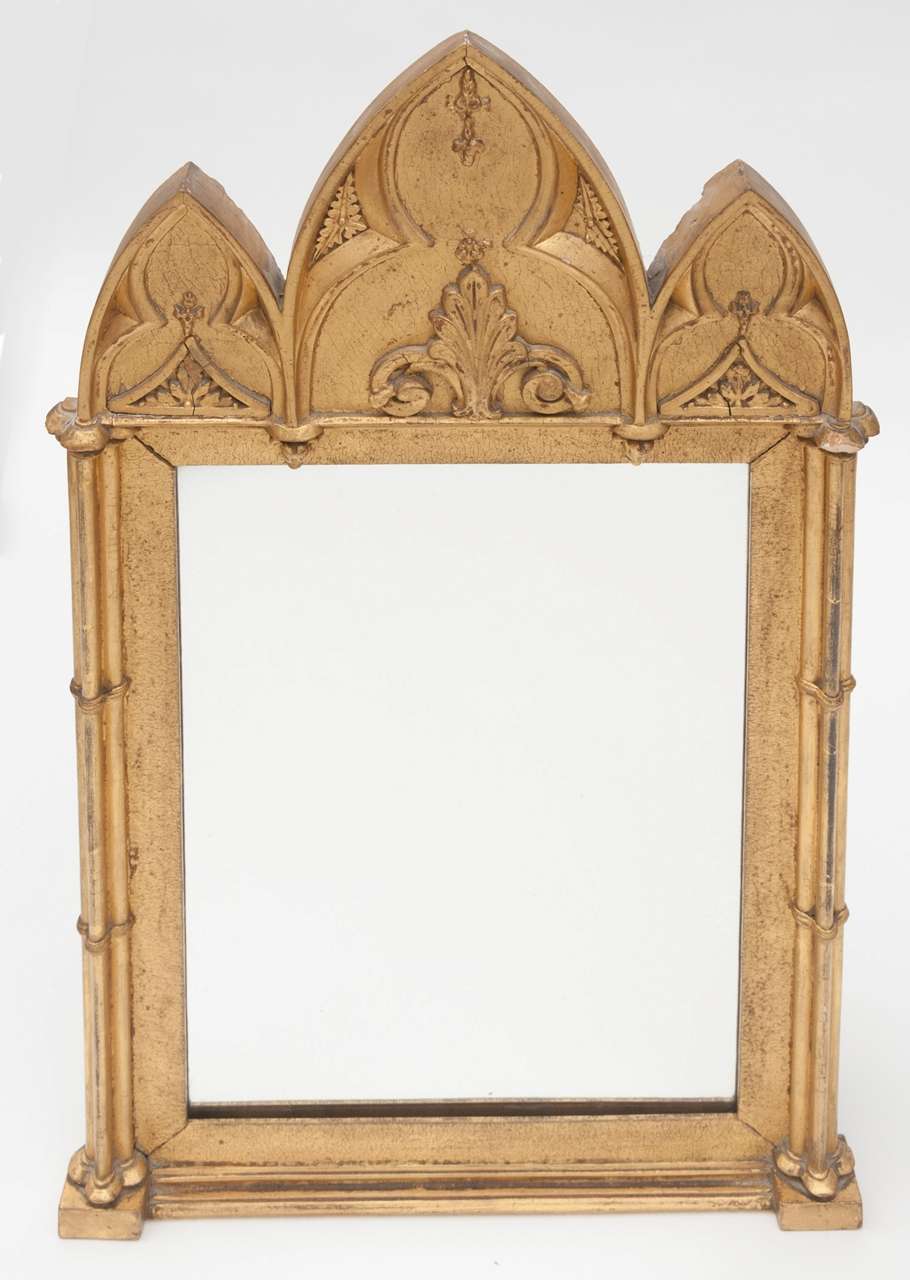 A most interesting small Late Regency carved wood and gilt Wall Mirror