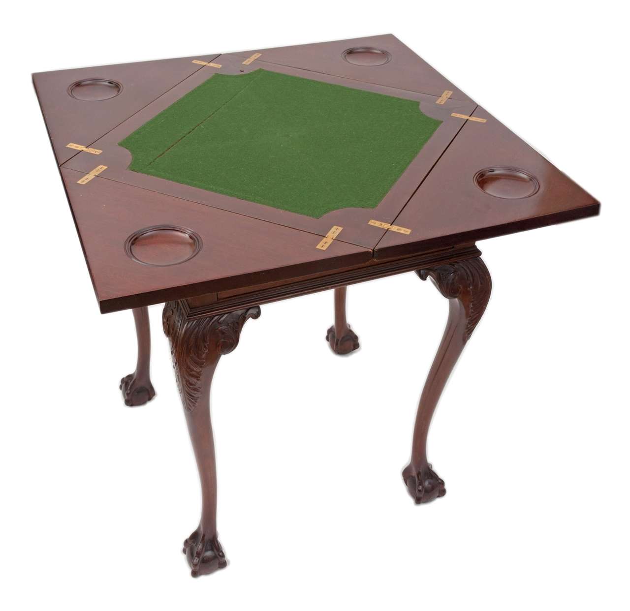 An Edwardian period ‘Centennial’ mahogany swivel and fold-over top card table, opening to reveal a baize covered top and money wells. With a single frieze drawer it stands on four well drawn cabriole legs and bold claw-and-ball feet.