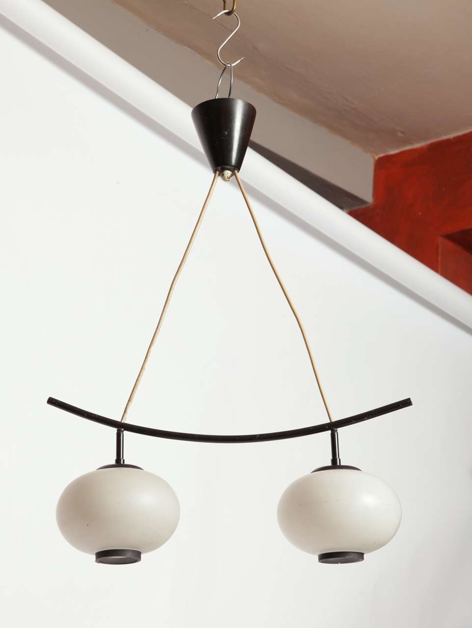 Opaline-glass fifties lamp, designed influenced by the Japonism, frame of metal and black lacquered.