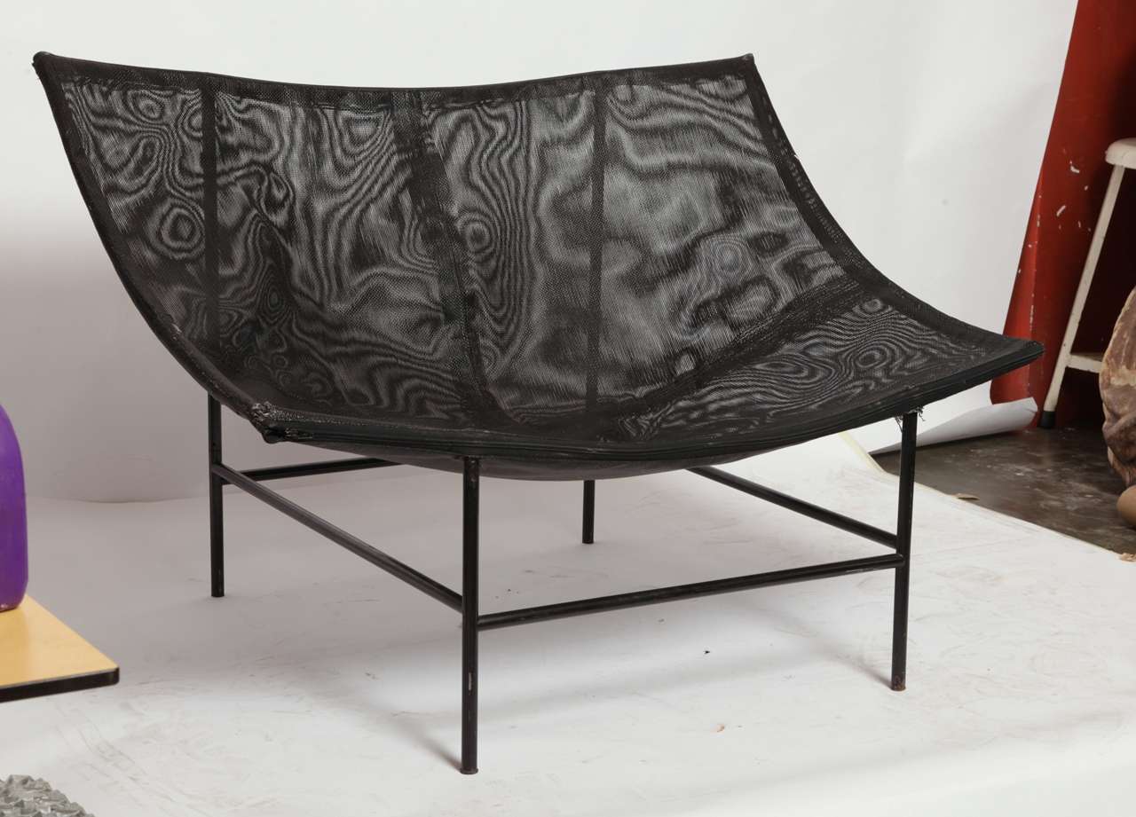 A pair Butterfly fauteuils designed by