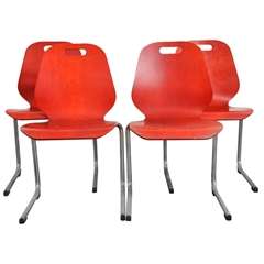 Set of 12 French Red Stacking Wood and Chrome Chairs