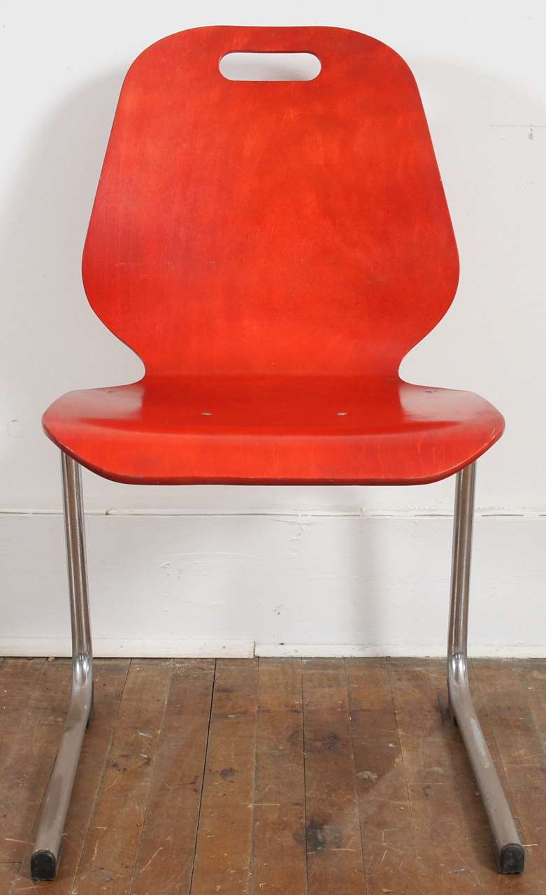 Late 20th Century Set of 12 French Red Stacking Wood and Chrome Chairs