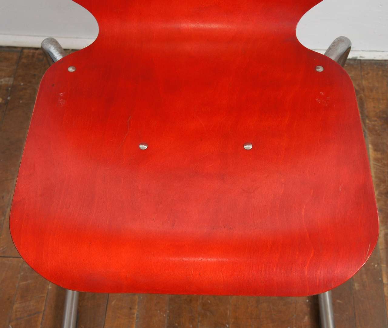 Set of 12 French Red Stacking Wood and Chrome Chairs 3