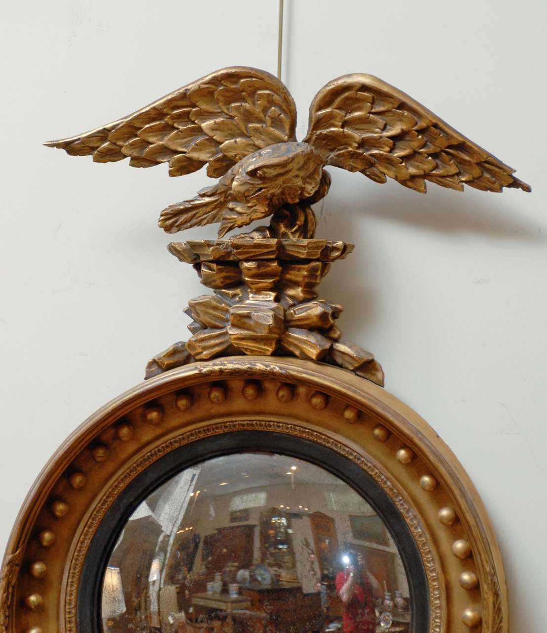 A 19th century English bull's eye convex mirror with eagle crest.

For many more fine antiques, please visit our online gallery at: www.williamwordantiques.com.

William Word Fine Antiques: Atlanta's source for antique interiors since 1956. 