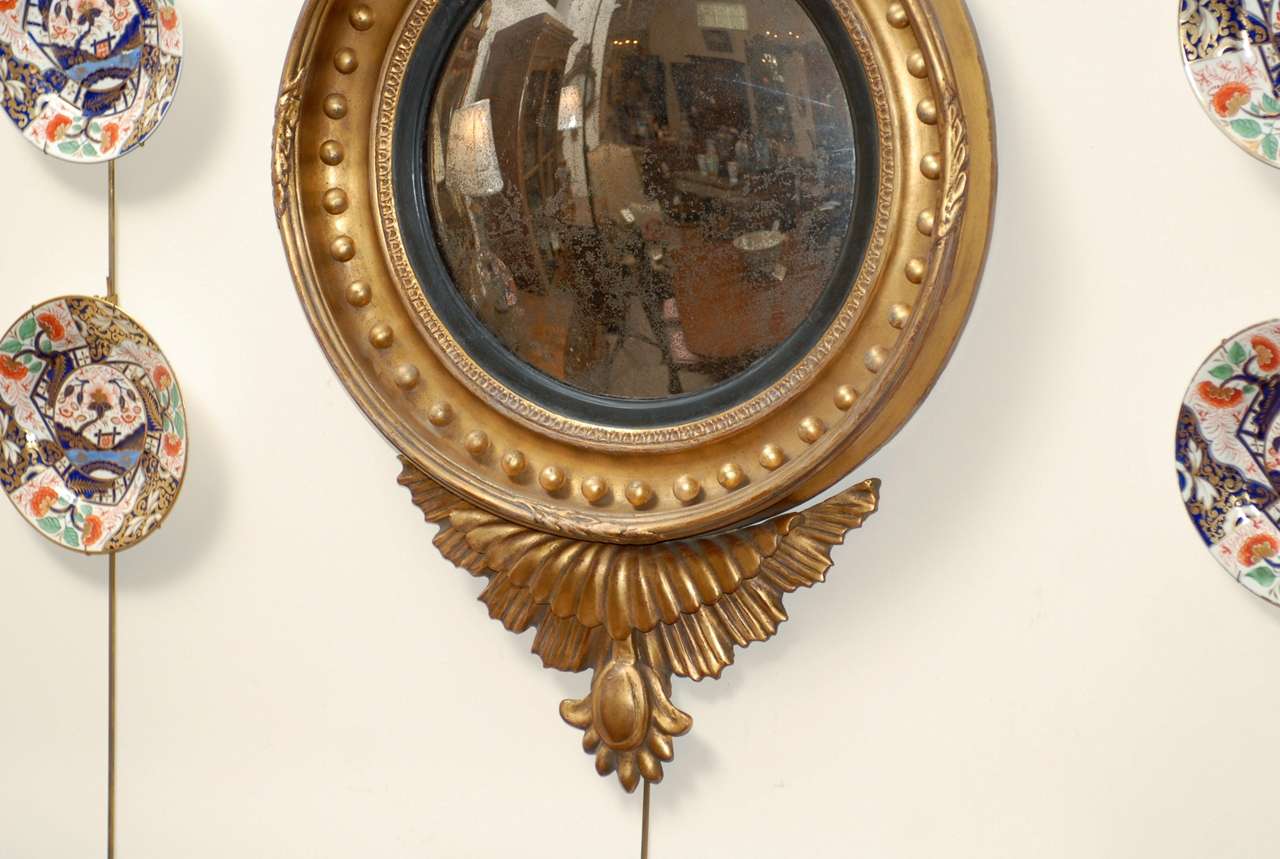 19th Century English Bull's Eye Convex Mirror with Eagle Crest