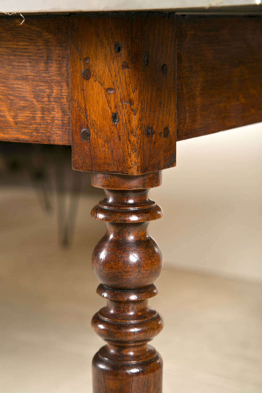 Oak and Chestnut turned leg french table with stainless steel top-base is C1880
Dealer Item # 033-08.