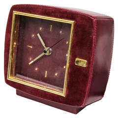 Mid-Century Leather and Suede Clock Presented by Funky Finders