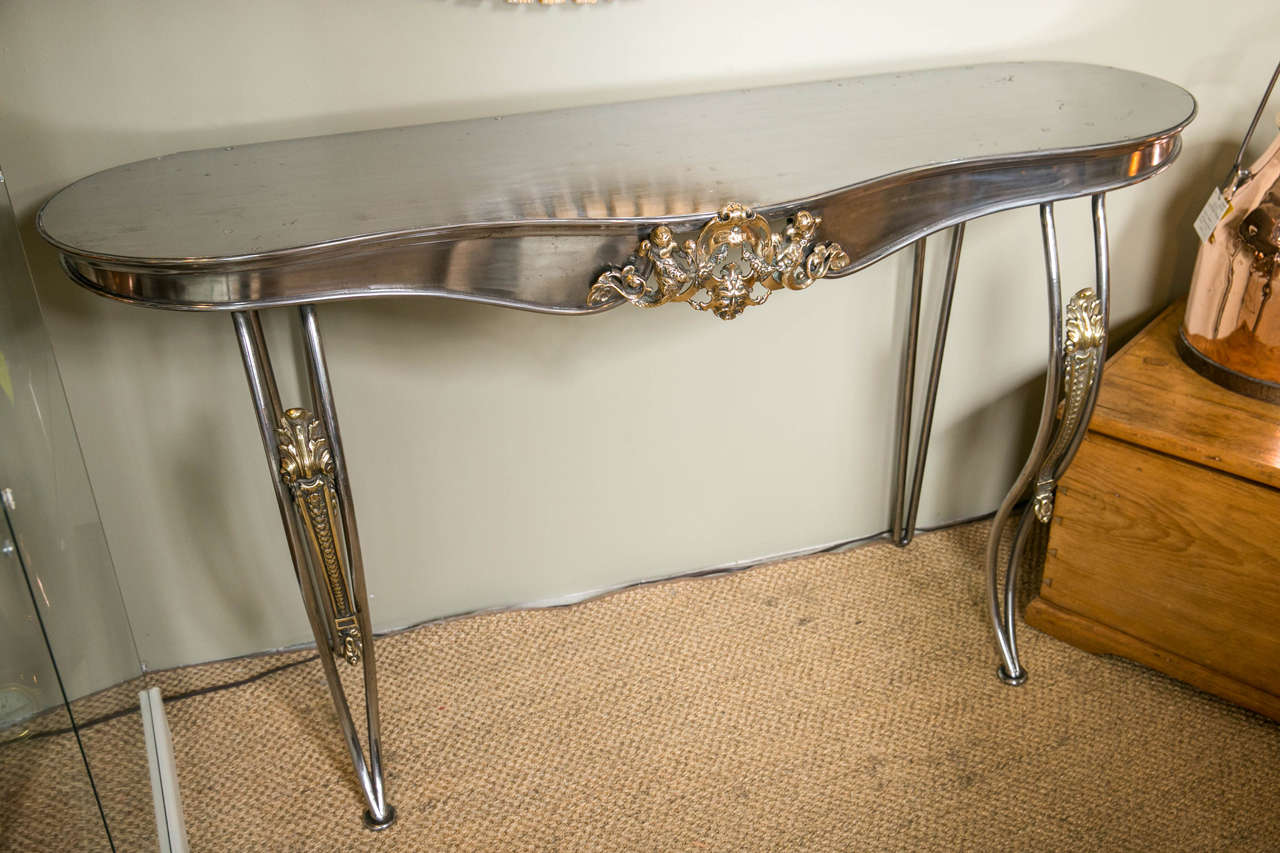 English polished steel console table made from Antique fireplace fender.  Fender is c.1860.