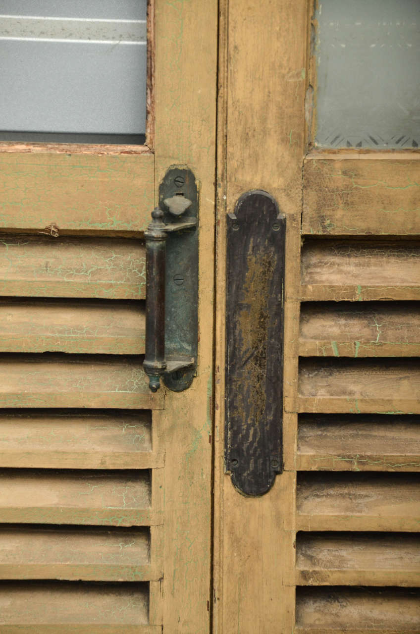 arched louvered doors