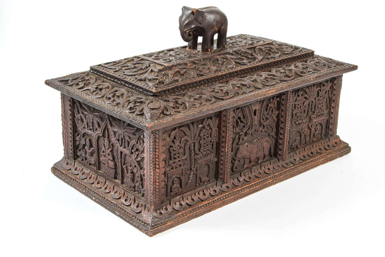 Antique carved wood box with elephant from Tibet.