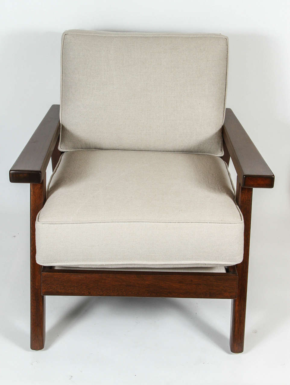 Pair of wood frame club chairs. Newly refinished with new cushions upholstered in flax linen.