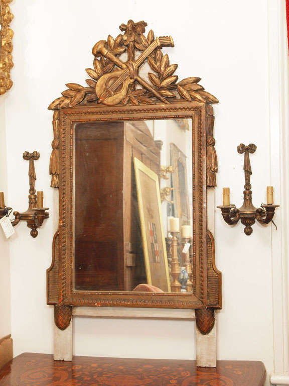 LOUIS XVI parcel gilt mirror with original plate