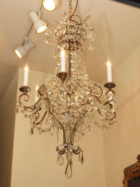 18th century gilt iron and crystal dressed basket shaped chandelier.