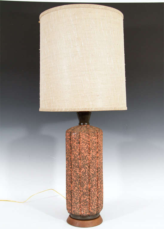 A pair of table lamps with a "splatter" effect finish over fluted bodies.<br />
<br />
Reduced From: $950

8165