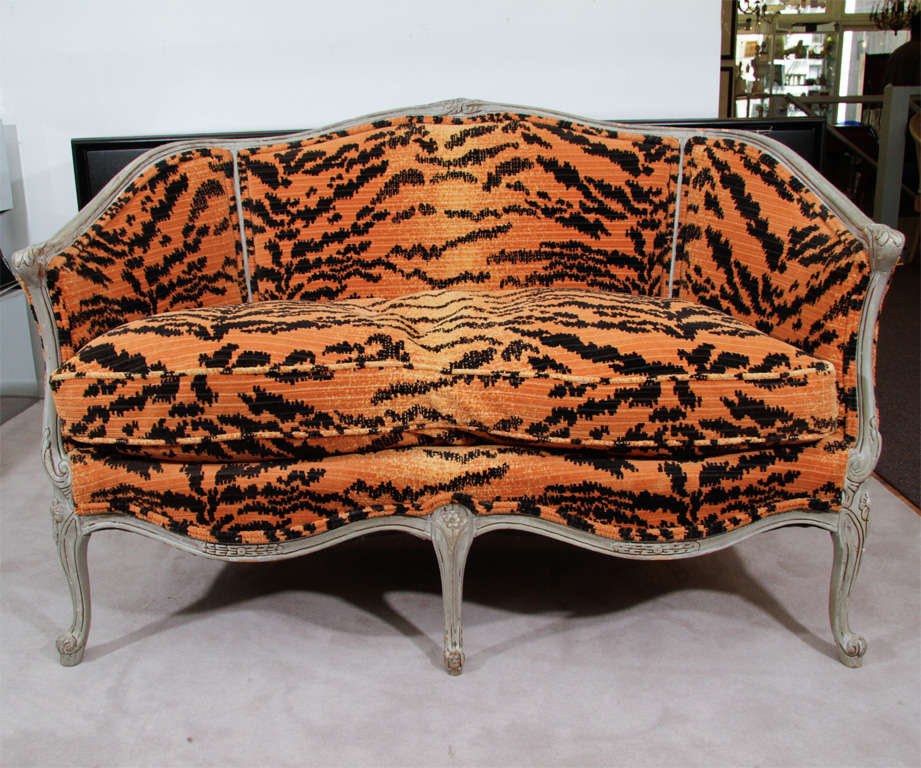 Louis XV style canape or settee with carved wood cabriole legs and frame. Upholstered in a tiger stripe velvet over down cushions.<br />
<br />
Price Reduced From $6500