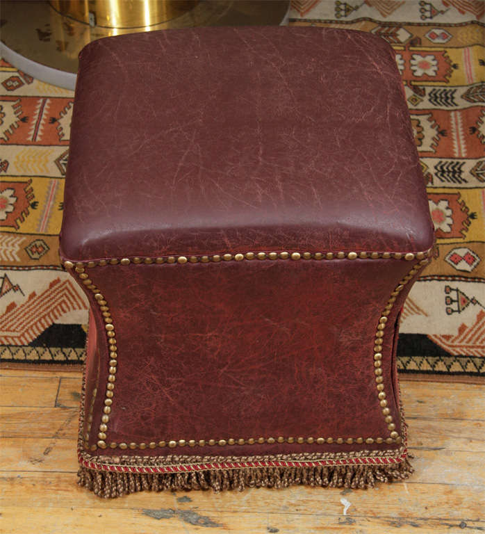 Vintage Distressed Leather Ottoman with Nailhead Detailing 2