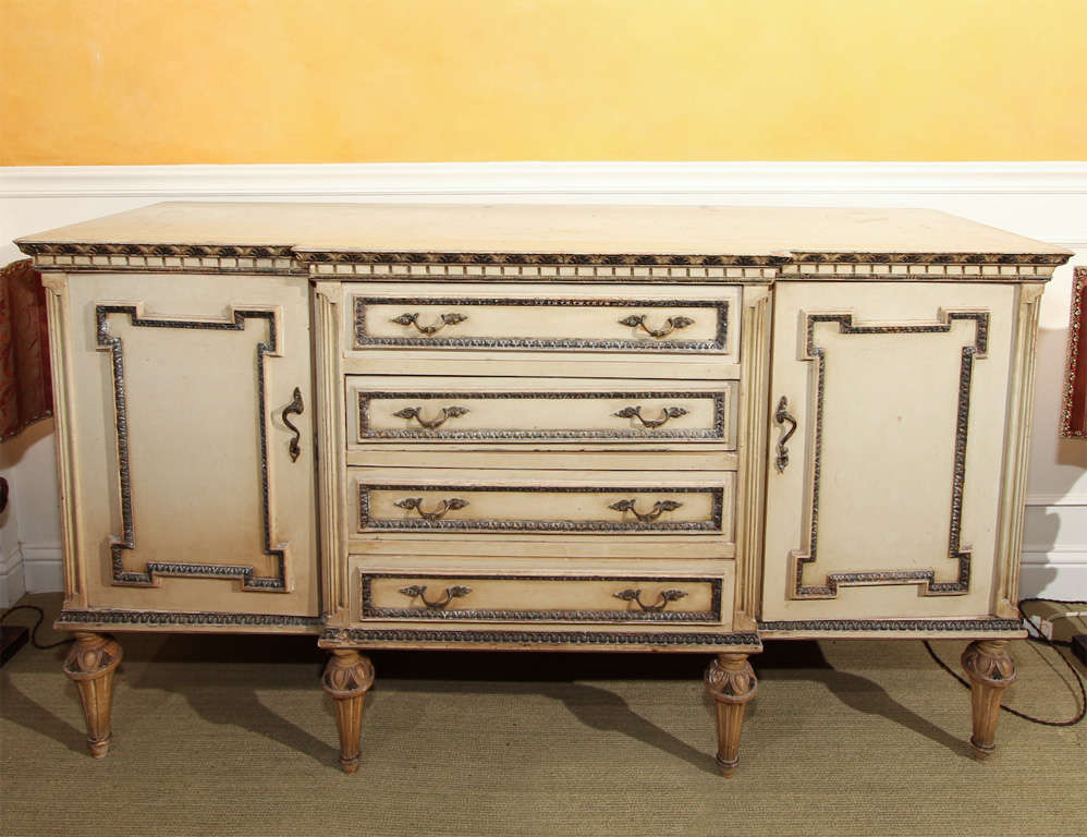 Italian painted side server or sideboard with 4 long drawers and 2 cabinet drawers wither side with interior shelf.