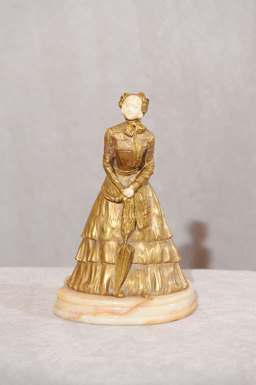 Gilt Bronze and Ivory Figure of a Young Maiden