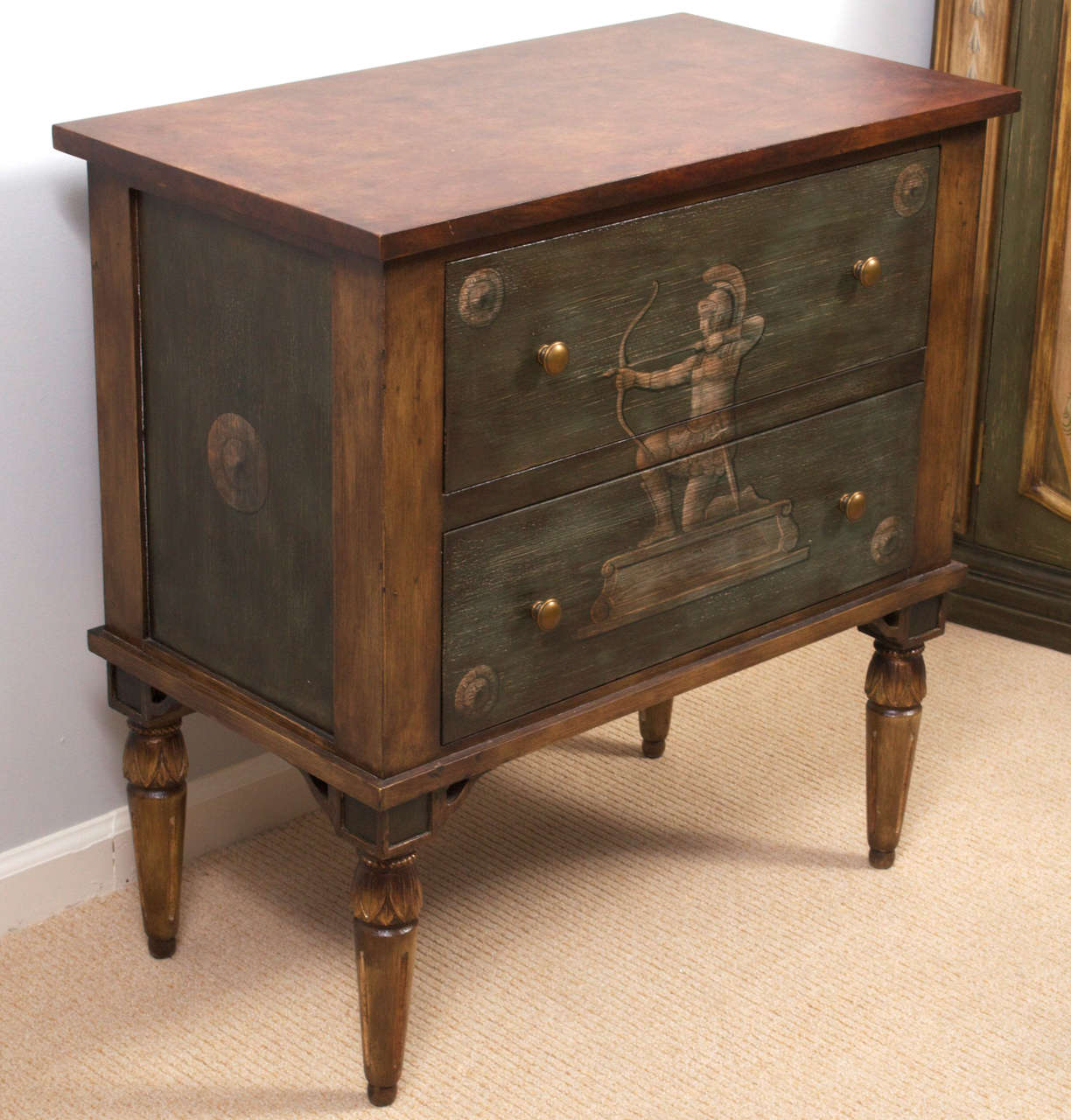 A pair of decorative commodes with paintings of mythological scenes