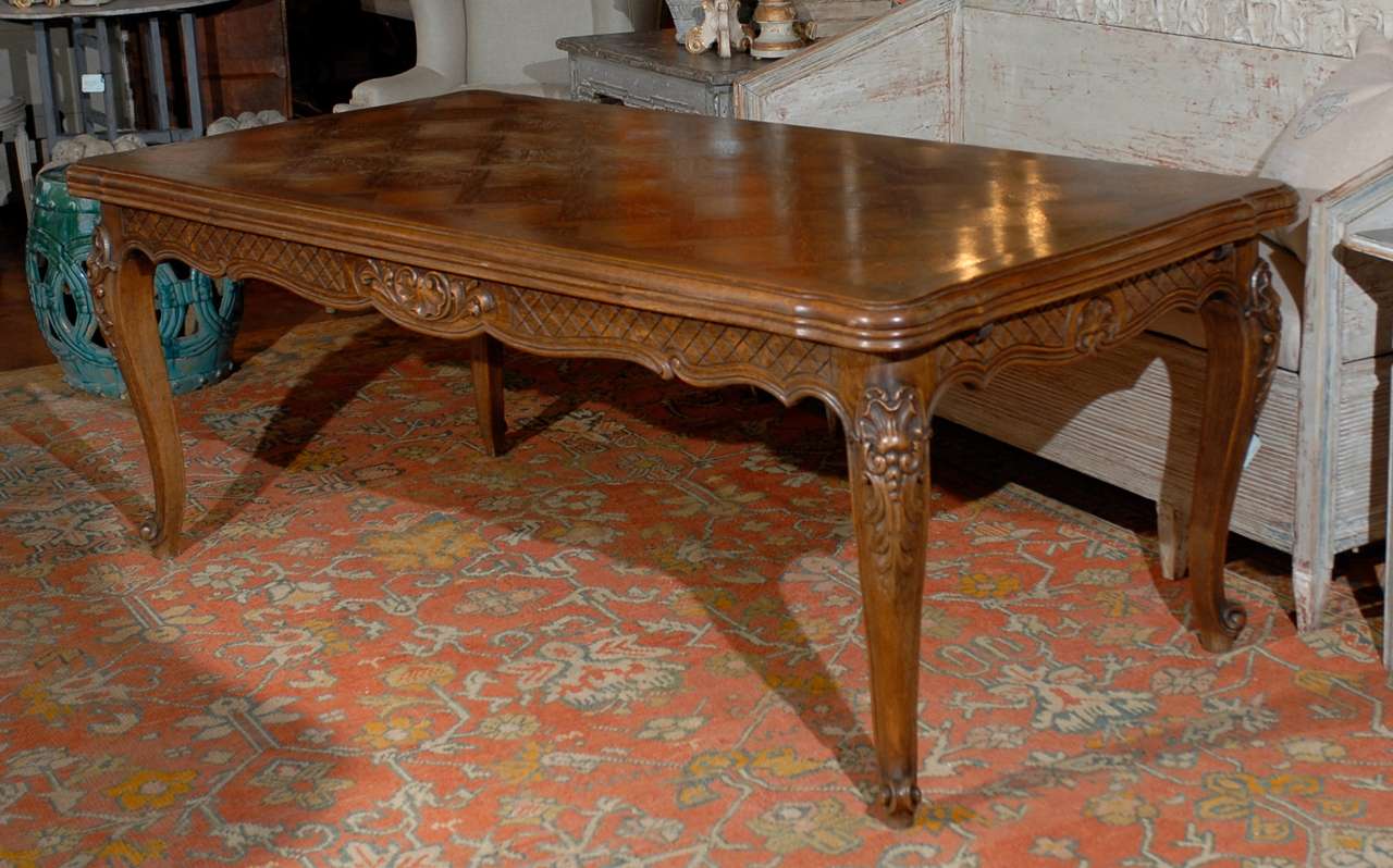 Beautiful French oak refectory table with carved apron and legs.  Extends to 116