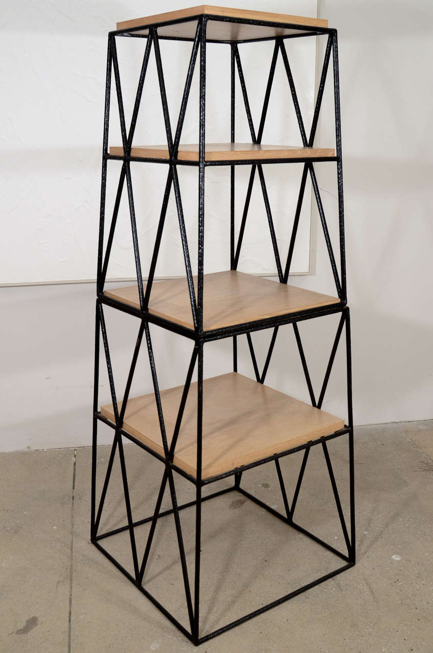 This etagere was part of Ashley Hicks first furniture collection, Jantar Mantar: two or three separate tables stacked up to form an obelisk-shaped display unit. An example of this etagere can be seen in Ashley Hicks Interiors section of his website