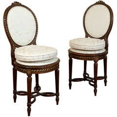 Antique Pair of Louis XVI style side chairs.