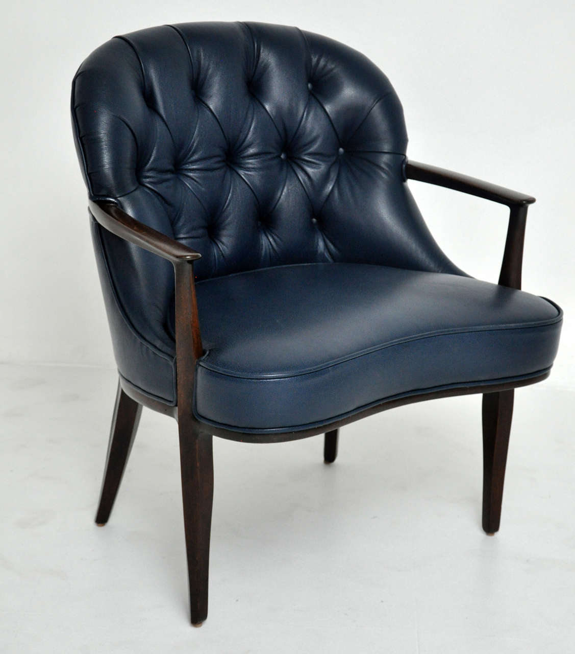 Janus chair by Edward Wormley.  Newly leather upholstery.  Original wood finish in excellent condition.