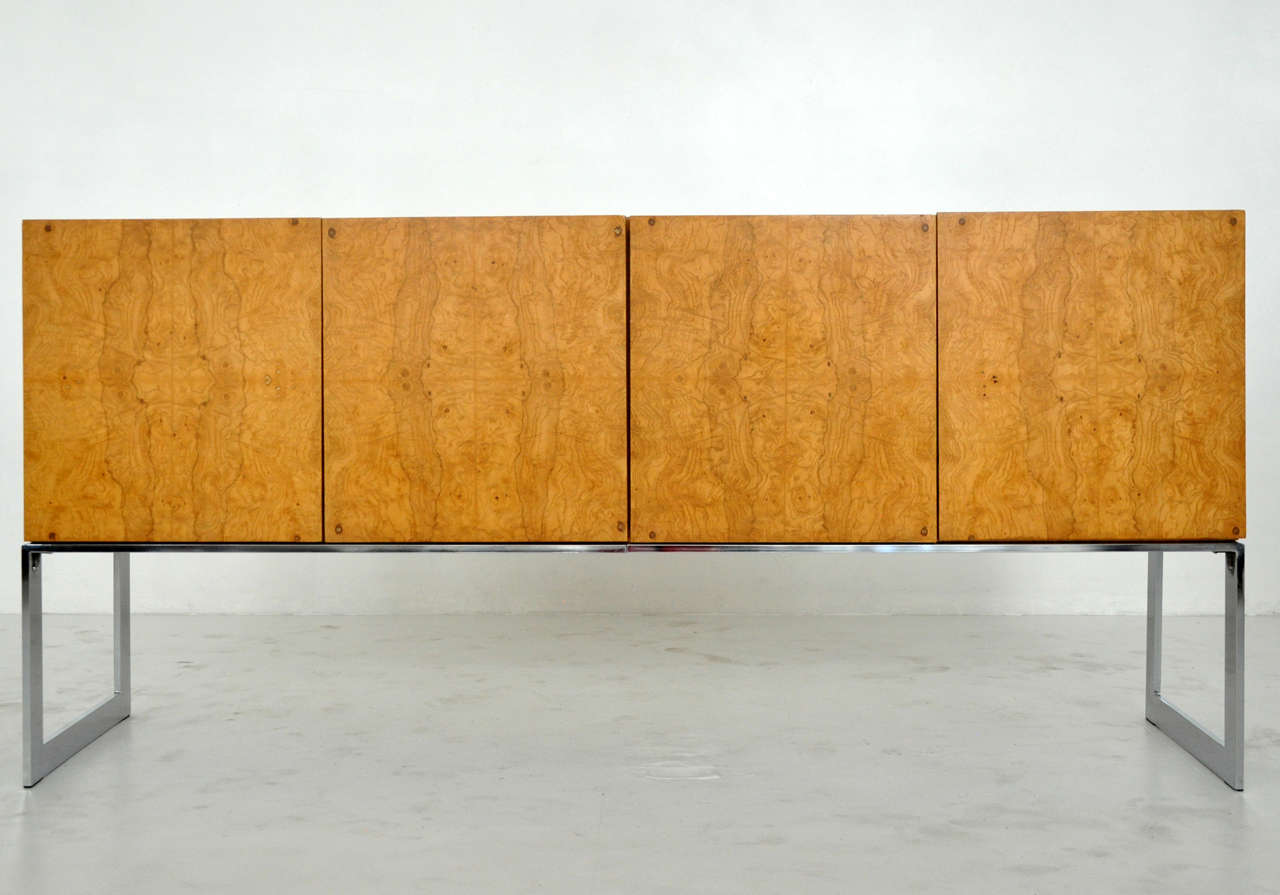 Burl wood sideboard on chrome base. Designed by Milo Baughman for Thayer Coggin.
 Matching dining set available.