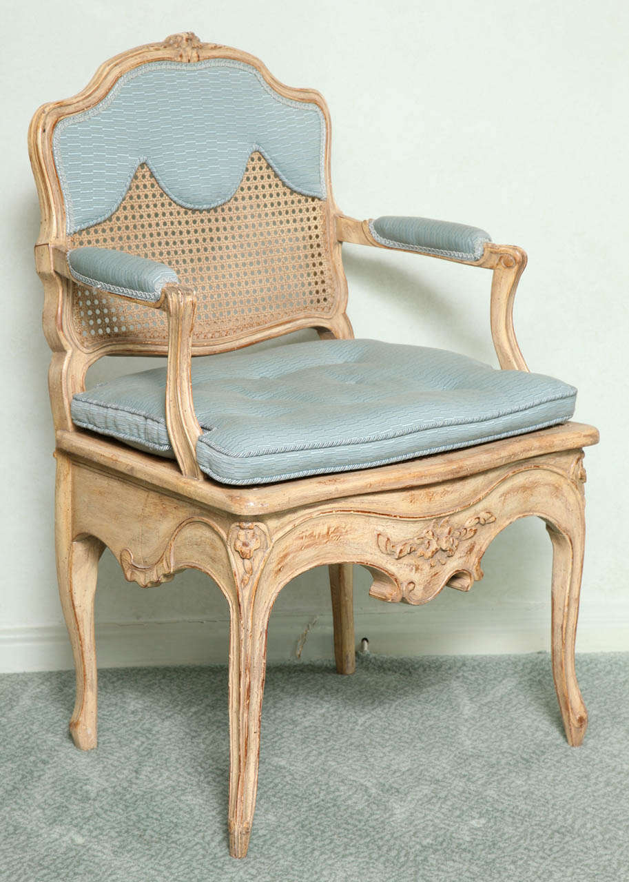 French A Pair of Louis XV Style Caned and Painted Armchairs