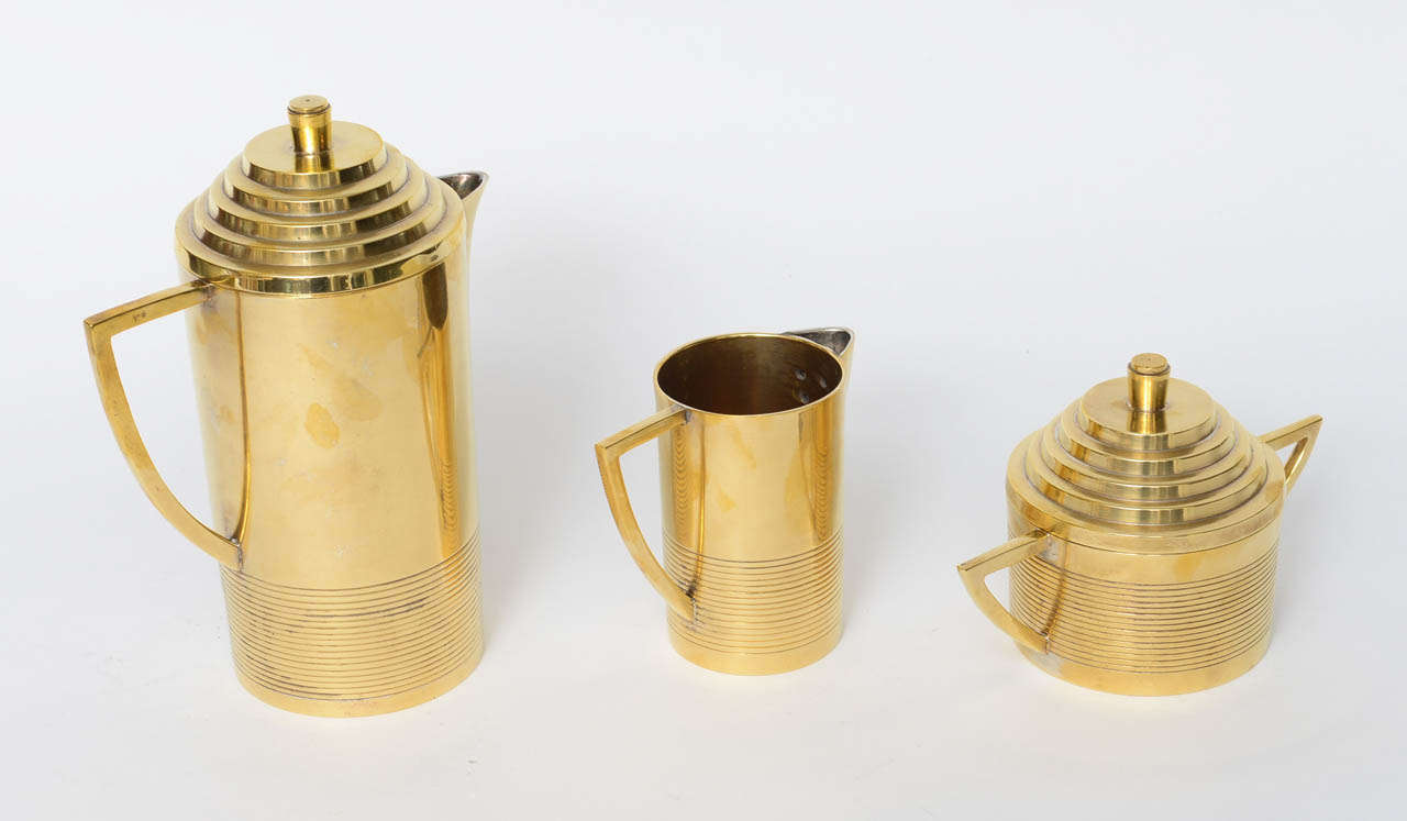 3 piece Tea service in brass, recently polished.