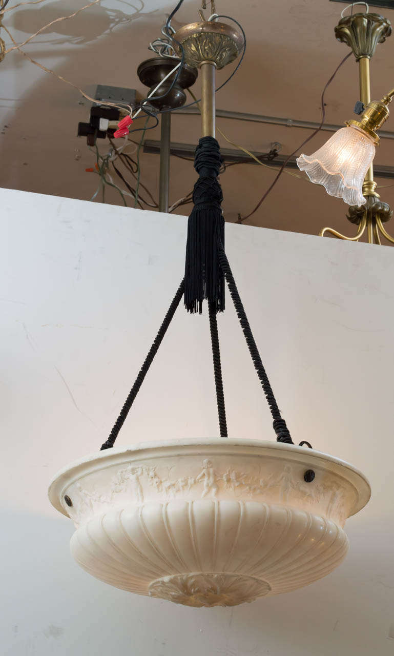 We have been selling alabaster pendants for many years and this is the finest carved one we have ever had.  Please note the finely carved neoclassical style border as well as the other nice features.