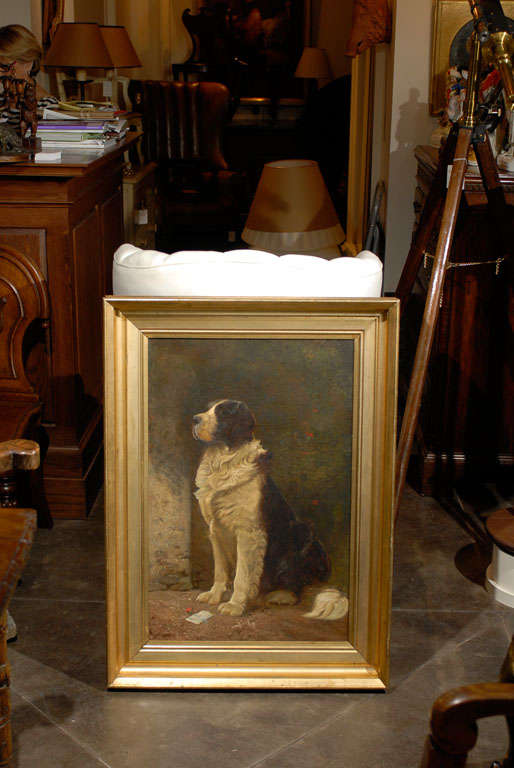 English painting of sitting dog in gilt frame.