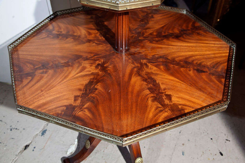 Mid-20th Century Flame Mahogany Octagonal Two-Tier Table White Marble Top Pedestal Base Jansen For Sale