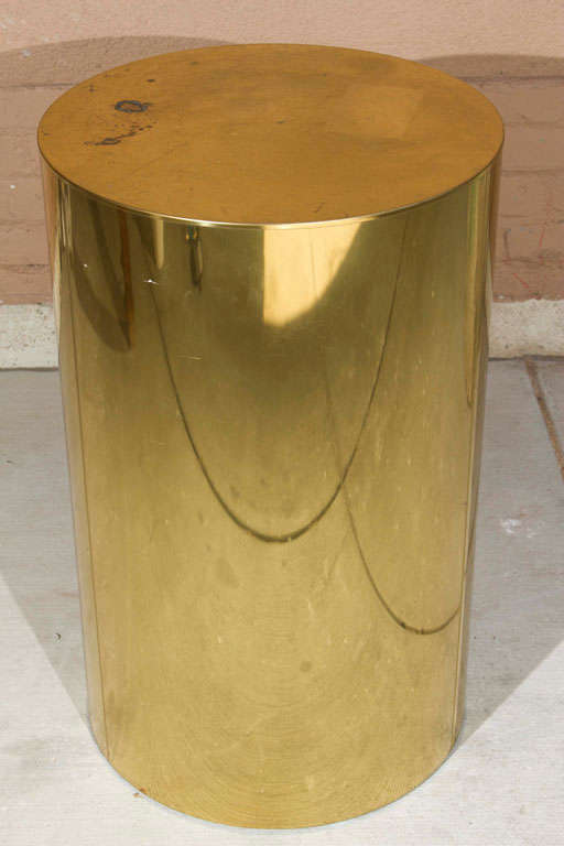 Brass cylindrical display pedestal by Curtis Jere.