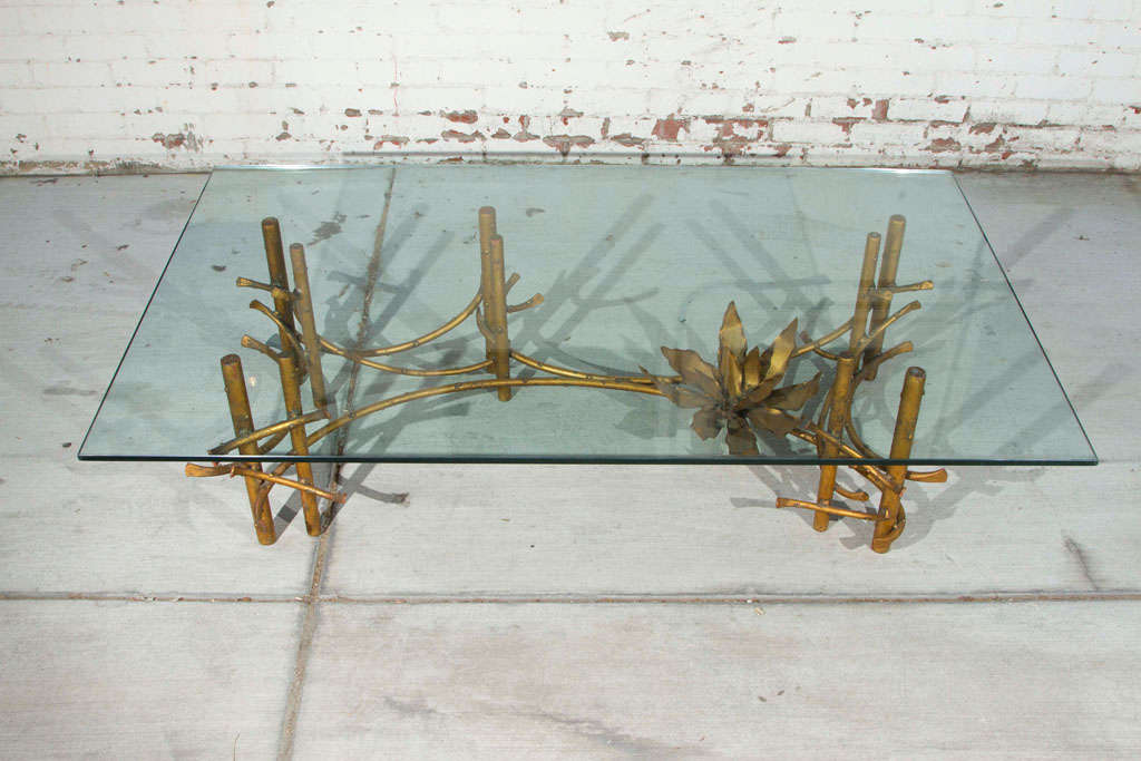 Brutalist brass coffee table with rectangular glass top attributed to Silas Seandel.