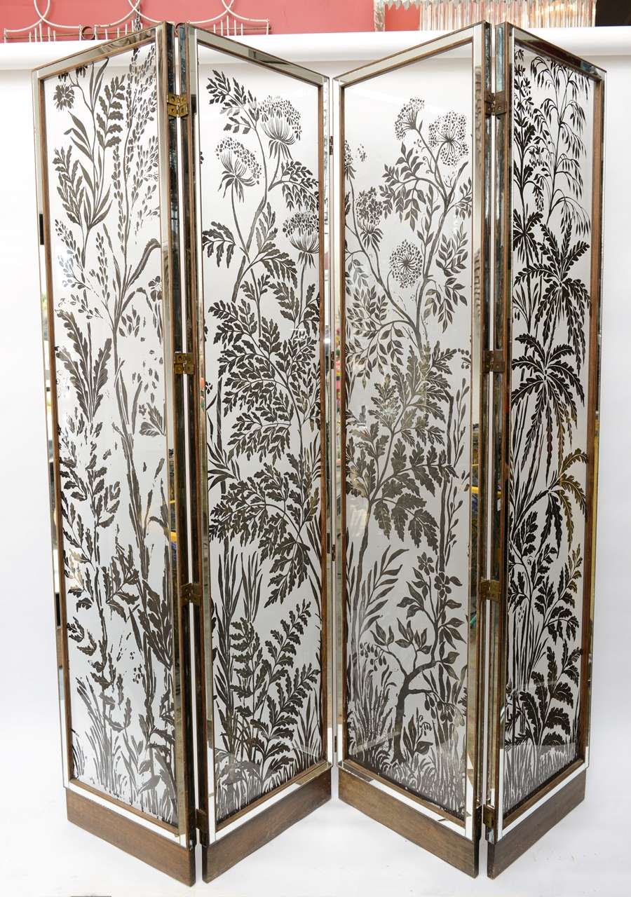 Incredible French four paneled glass screen with silver overlay floral motif and mirrored edging. From Elizabeth Arden Estate.