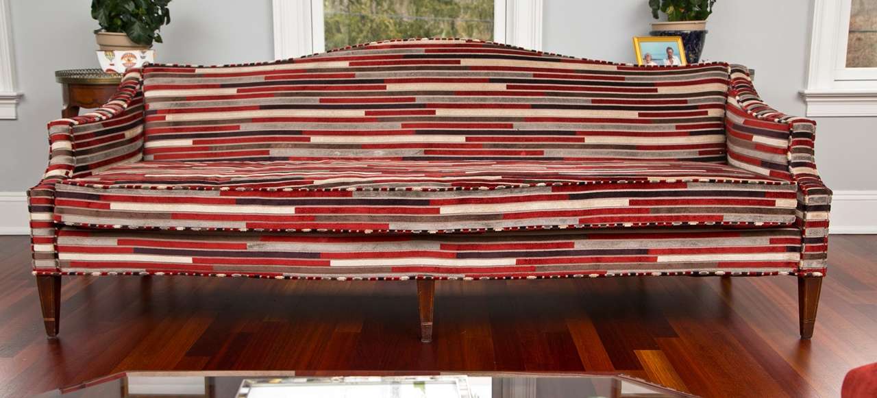 Recently reupholstered in a fine multi colored striped chenille.  Mahogany legs with box wood inlay - 24