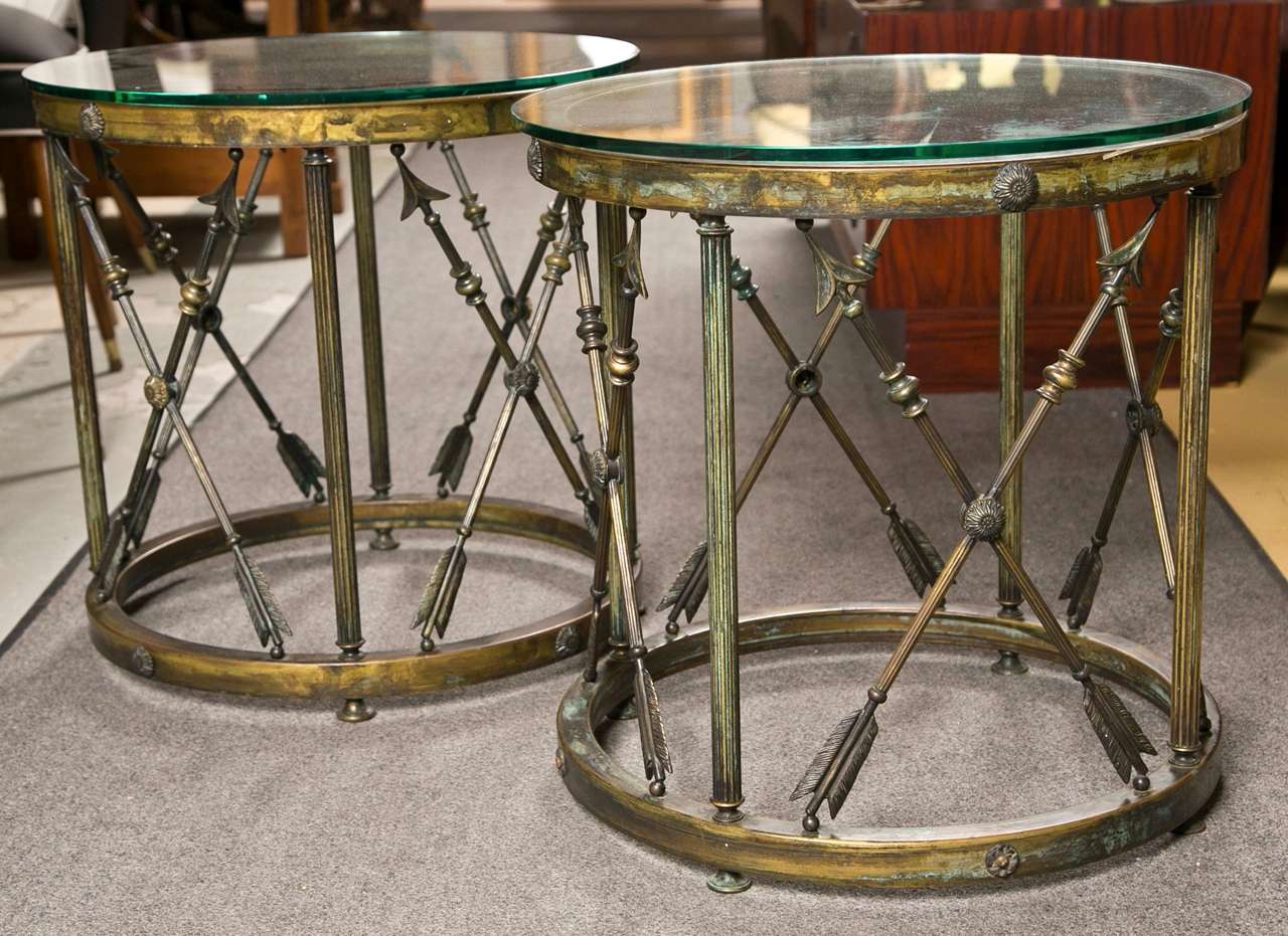 A spectacular Directoire Drum Table. The circular base having four feet leading to an  arrow X design pedestal base with four column supports.