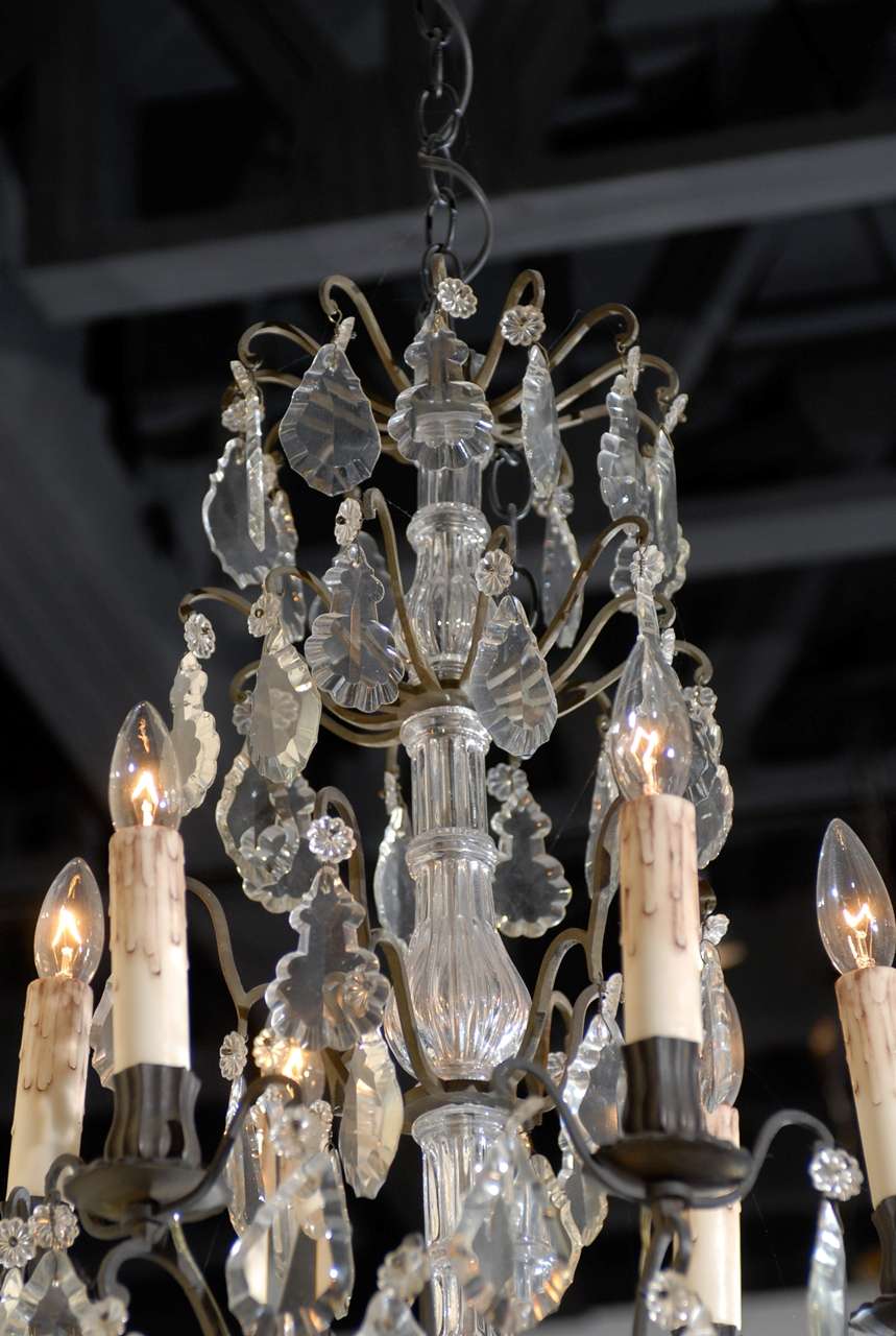 19th century iron and crystal chandelier from France, circa 1890.