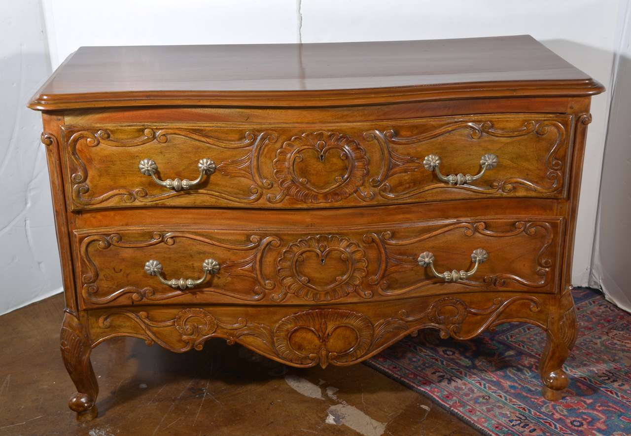 late 18th c to early 19th c French Walnut carved provencial commode. Hand pegged construction 