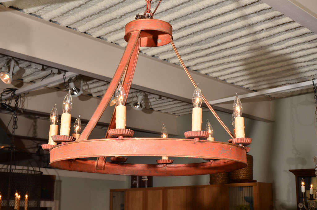 Tole 10-light chandelier with original red paint, simple in form.
