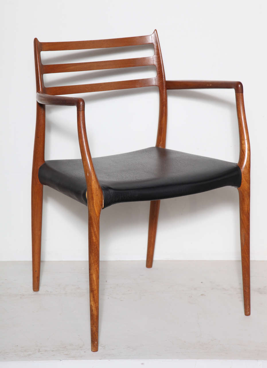 Vintage 1960s Teak Dining Chairs by Neils Moller

These Neils Moller dining chairs are in excellent condition. The frame is like new. The black vinyl might need an update. We can re-upholster or have them paper-corded for an extra cost as Mr.