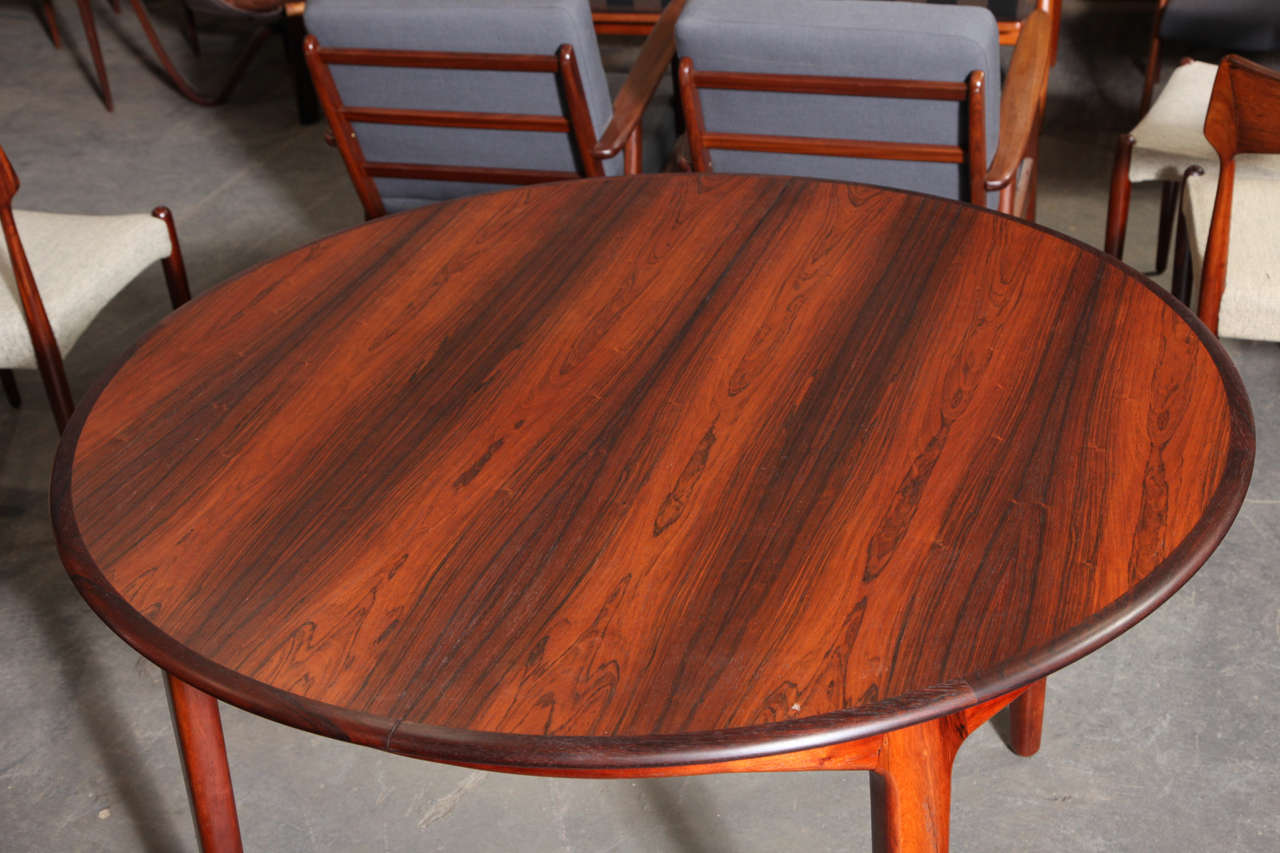 Danish Round Dining Table by Henning Kjaernulf, with Four Leaves