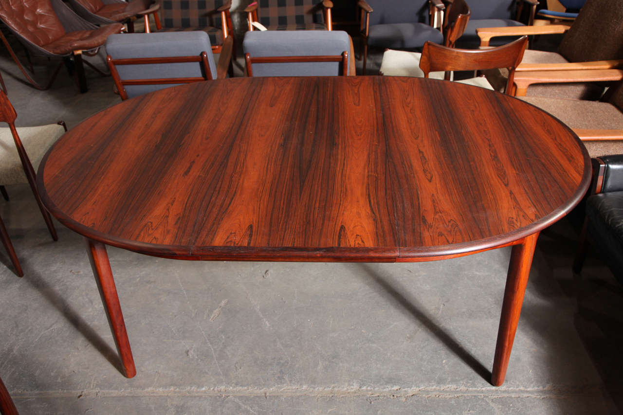 Round Dining Table by Henning Kjaernulf, with Four Leaves In Excellent Condition In New York, NY
